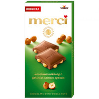 Шоколад молочный Merci с цельным лесным орехом, 100г